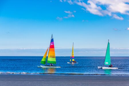 Three Sailboats at Beachのeditorial素材