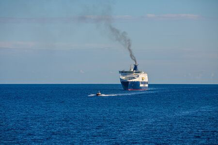 Pilot Leading Cargo Shipのeditorial素材