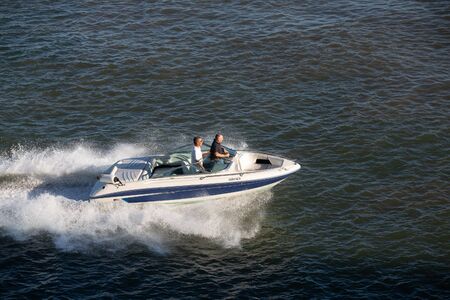 Two Men in Fast Boatのeditorial素材