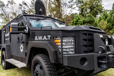 ALPHARETTA, GEORGIA - September 29, 2018: In the United States, a SWAT Special Weapons and Tactics team is a law enforcement unit which uses specialized or military equipment and tactics.のeditorial素材