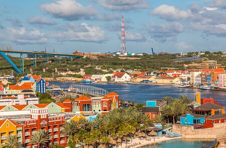 WILLEMSTAD, CURACAO - November 16, 2016: While still an industrial shipping port, Willimestad, with its colorful architecture is becoming a Caribbean tourist mecca and cruise ship destination.のeditorial素材