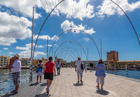 WILLEMSTAD, CURACAO - November 16, 2016: While still an industrial shipping port, Willimestad, with its colorful architecture is becoming a Caribbean tourist mecca and cruise ship destination.のeditorial素材