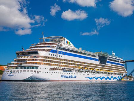 WILLEMSTAD, CURACAO - February 21, 2017: While still an industrial shipping port, Willimestad, with its colorful architecture is becoming a Caribbean tourist mecca and cruise ship destination.のeditorial素材