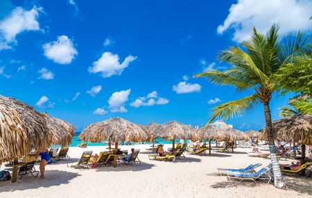 Straw Umbrellas on Aruba Beachのeditorial素材
