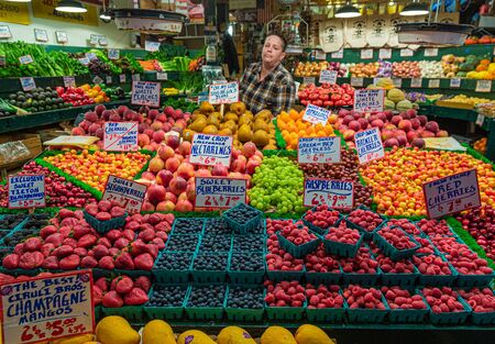 Vendor Behind Fruit Market