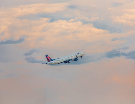 Delta Rising Through Sunset