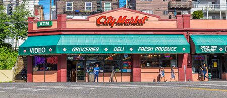 SEATTLE, WASHINGTON - May 21, 2017: Logging was Seattle's first major industry, but this has long been replaced by shipping, tourism, technology, and music, and has a strong counter-culture presence.のeditorial素材