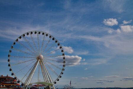 The ferris wheel on the waterfront of Seattle, Washington in late afternoon lightのeditorial素材