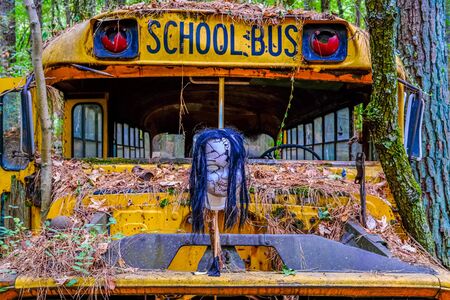 Horror Mask on School Busの写真素材