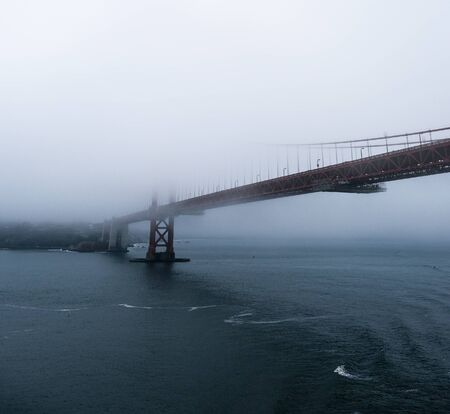 Golden Gate Rising From Fogの写真素材