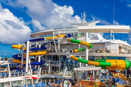 MIAMI, FLORIDA - December 10, 2018: Group led pool games, bars, outdoor fun, entertainment and innovative activities attract new cruisers every year.のeditorial素材
