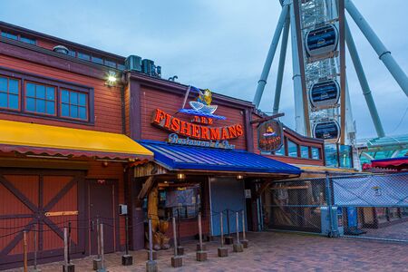 SEATTLE, WASHINGTON - July 4, 2019: The Seattle Great Wheel is a Ferris wheel at Pier 57 in Seattle, Washington. It was the tallest Ferris wheel on the west coast when it opened on June 29, 2012.のeditorial素材