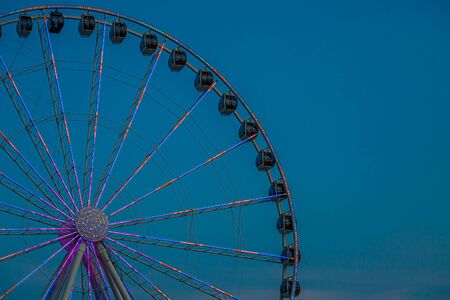 SEATTLE, WASHINGTON - July 4, 2019: The Seattle Great Wheel is a Ferris wheel at Pier 57 in Seattle, Washington. It was the tallest Ferris wheel on the west coast when it opened on June 29, 2012.のeditorial素材