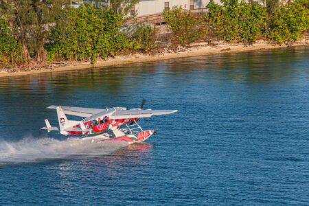 Red and White Seaplane Taking Offのeditorial素材