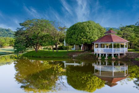 Gazebo and Trees on Blue Lakeの写真素材