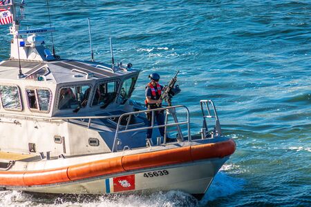 Coast Guard on Bow Gunのeditorial素材