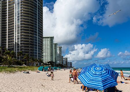 Blue Beach Umbrellas and High Rise Condosのeditorial素材