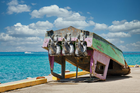 An Old Fishing Boat Upside Down on Dock