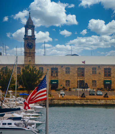 Old Naval Dockyard Clocktower Beyond American Flagのeditorial素材