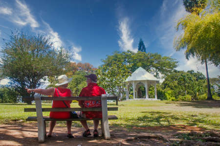 Older Couple on Park Bench on Dominicaのeditorial素材