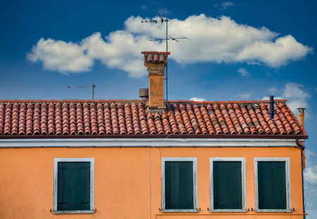 Red Tile Roof on Orange Stuuco Building