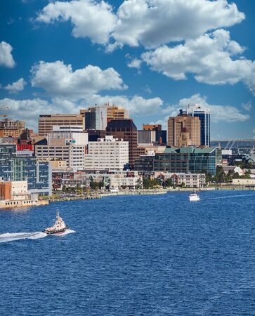 Tugboat Sailing Past Halifaxの写真素材