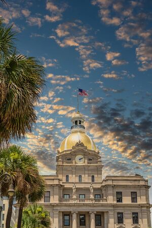 Classic old Savannah, Georgia City Hall with Gold Dome and American Flagの写真素材