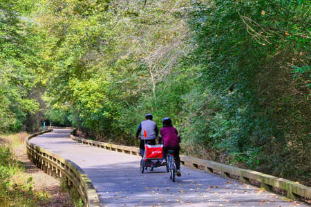 Couple Cycling with Baby Carrierのeditorial素材