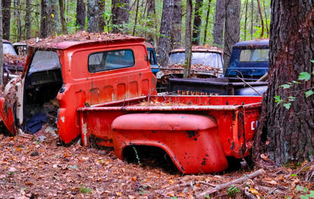 Old Red Pickup in Woodsのeditorial素材