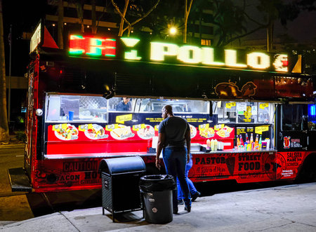 Man at Taco Truck at Night