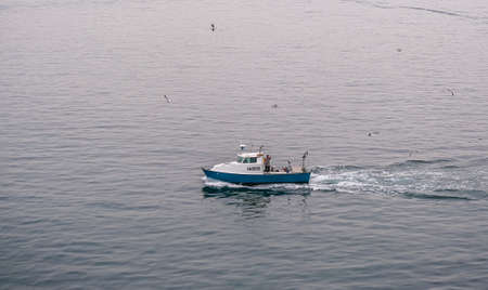 Fishing Boat in Calm Bayのeditorial素材