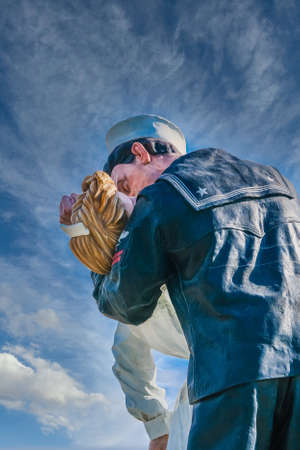 Unconditional Surrender Statue Against Skyのeditorial素材