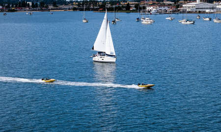White Sailboat and Yellow Speedboatsのeditorial素材