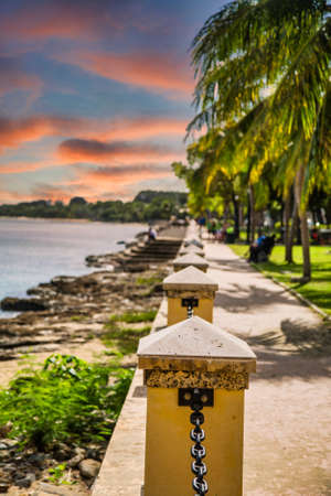 Plaster and Chain Fence Along St Croix Waterfront at Duskの写真素材