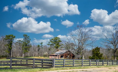 Old Barn Behind Fence