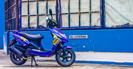 Blue Scooter on Curb