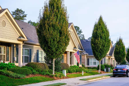 American Flag on Townhouse in Morningのeditorial素材