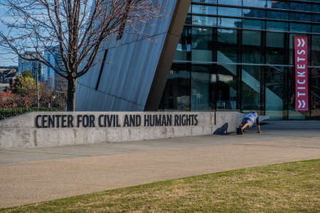 Man Doing Pushups at Center for Civil and Human Rightsのeditorial素材