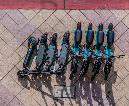 Rental Scooters on Sidewalk from Above