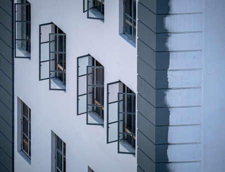 Open Windows in White Buildingの写真素材