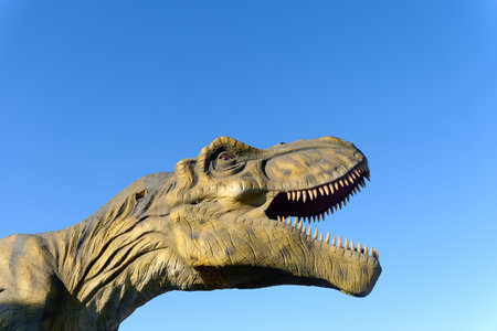 Tyrannosaurus Rex Against Blue Skyのeditorial素材