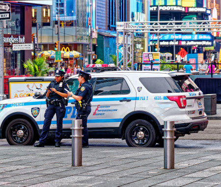 Two NYPD Officers in Times Squareのeditorial素材