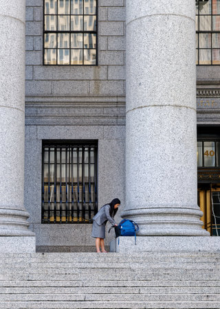 Female Lawyer outside United States Court House in New York Cityのeditorial素材