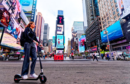 Woman on Scooter in Times Square