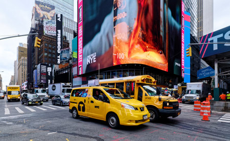 Yellow Cab and Schoolbus in Times Square