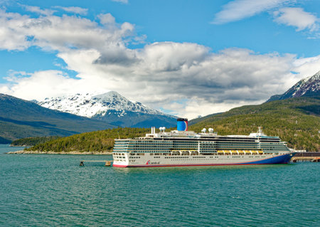 Carnival Luminosa and Mountains in Skagway, Alaskaのeditorial素材