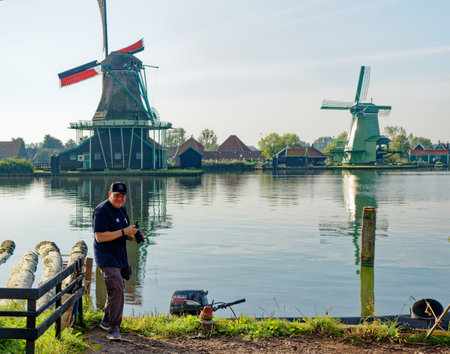 Photographer by Windmill in Rural Holland near Amsterdamのeditorial素材