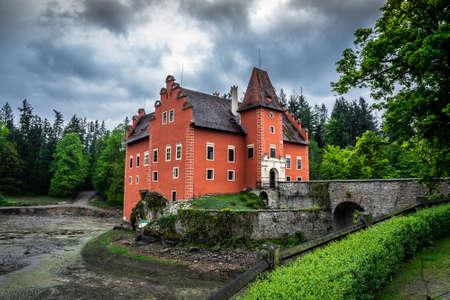 Cervena Lhota Chateau. It stands at the middle of a lake on a rocky island. Its picturesque Renaissance is a destination of thousands of tourists every year.のeditorial素材
