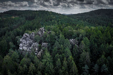 White stones - The group of white sandstone rocks is divided by three wide cracks into several separate blocks, which form a small rock city. The 20-meter-high rocks resemble the shape of elephants.の写真素材