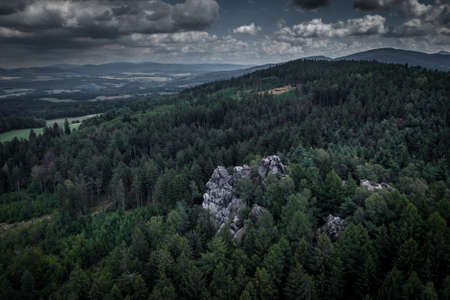 White stones - The group of white sandstone rocks is divided by three wide cracks into several separate blocks, which form a small rock city. The 20-meter-high rocks resemble the shape of elephants.の写真素材